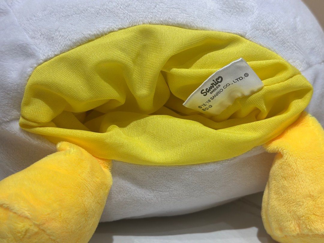 Sanrio Gudetama Plush Toy (Category: Plushies & Soft Toys) located in Taguig. Submitted by beerackph (Listing ID 1402228543, Image 3). Description: - Adorable Gudetama plush toy! - Features the iconic lazy egg design. - Soft and cuddly material. - Perfect for snuggling. - Includes a small pocket at the back. - Authentic Sanrio tag is visible..