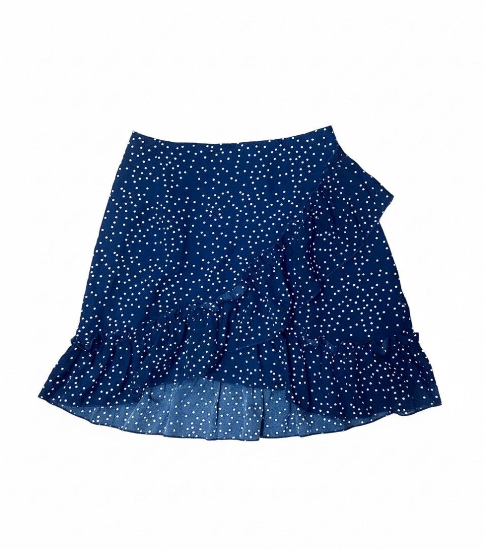 SHEIN Polka Dot Ruffle Skirt - Size M (Category: Skirts) located in Quezon City. Submitted by jay0708 (Listing ID 1402173099, Image 1). Description: - SHEIN skirt - Navy blue with white polka dots - Ruffle hem detail - Wrap style design - Size: M (EU 38, US 6) - Material: 100% polyester - Made in China P.S it's the same as the white listed item skirt just a diff color ( both items could fit a small and a medium ) pm for exact measurements.