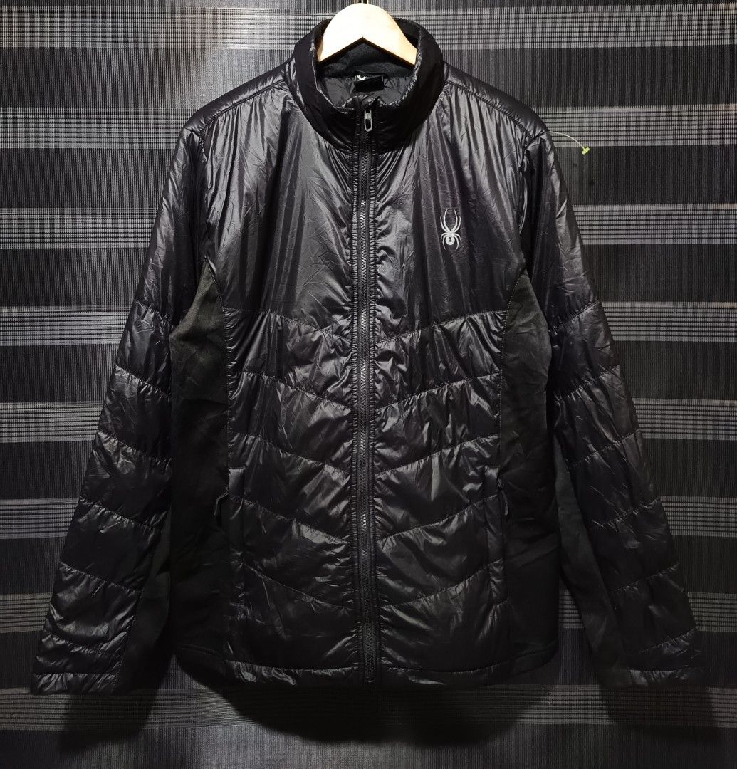 Spyder Black Padded Jacket - M (Category: Coats, Jackets and Outerwear) located in Imus. Submitted by thrift.maulas (Listing ID 1402281172, Image 1). Description: -Excellent Condition -Size M -Dimes 21.5x29 - Full zip closure - Quilted design - Stand-up collar - Insulated for cooler weather - Unique back design - Spyder logo on chest - Made in China.