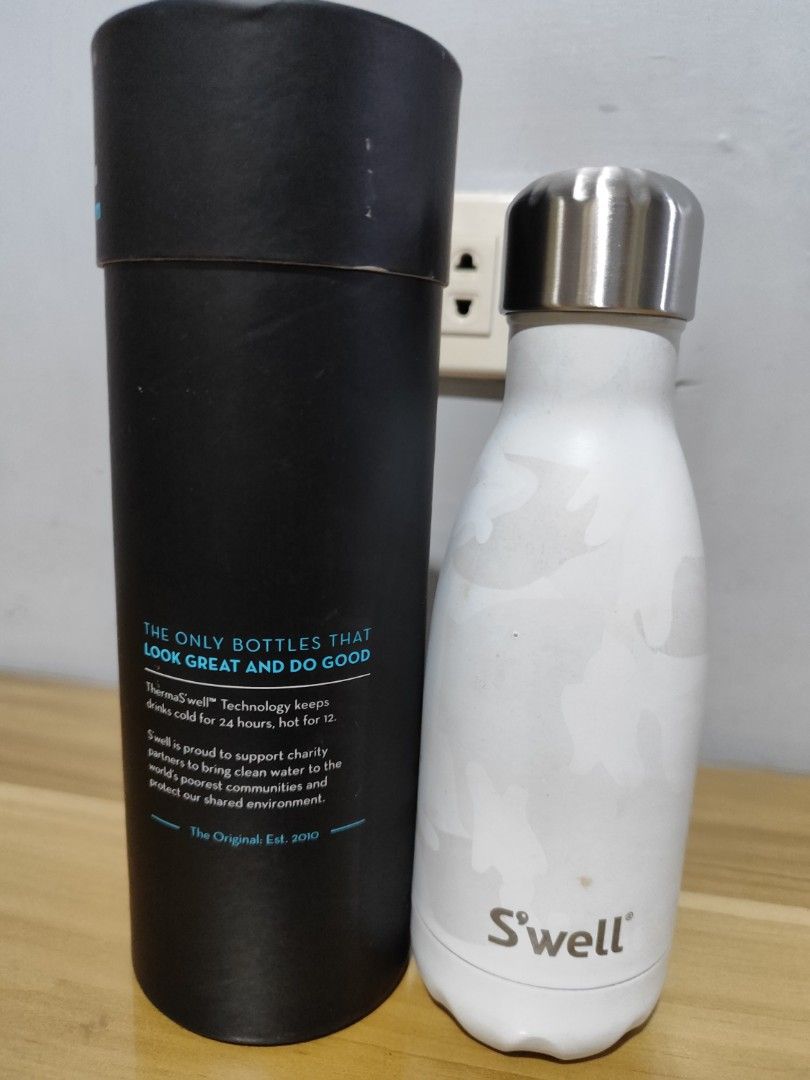 S'well White Camo Water Bottle 9oz (Category: Water Bottles & Tumblers) located in Minalin. Submitted by easyshoppe15 (Listing ID 1402280296, Image 2). Description: Our S'well Vacuum Insulated Stainless Steel Water Bottle, Angel Food, 9 oz. gets you from Point A to Point B with ease. Vacuum-insulated, double-walled 18/8 stainless steel construction and a pop-open lid make splash-proof drinking easy and fun, keeping your favorite drinks cold or ho