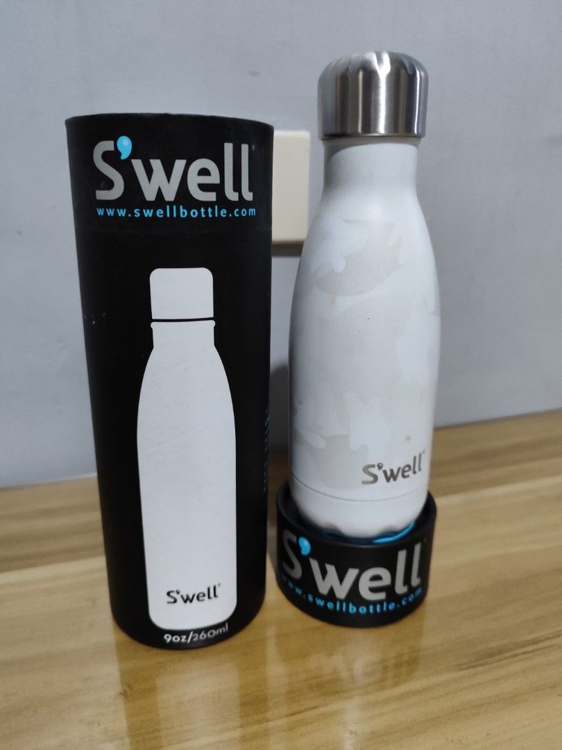 S'well White Camo Water Bottle 9oz (Category: Water Bottles & Tumblers) located in Minalin. Submitted by easyshoppe15 (Listing ID 1402280296, Image 3). Description: Our S'well Vacuum Insulated Stainless Steel Water Bottle, Angel Food, 9 oz. gets you from Point A to Point B with ease. Vacuum-insulated, double-walled 18/8 stainless steel construction and a pop-open lid make splash-proof drinking easy and fun, keeping your favorite drinks cold or ho