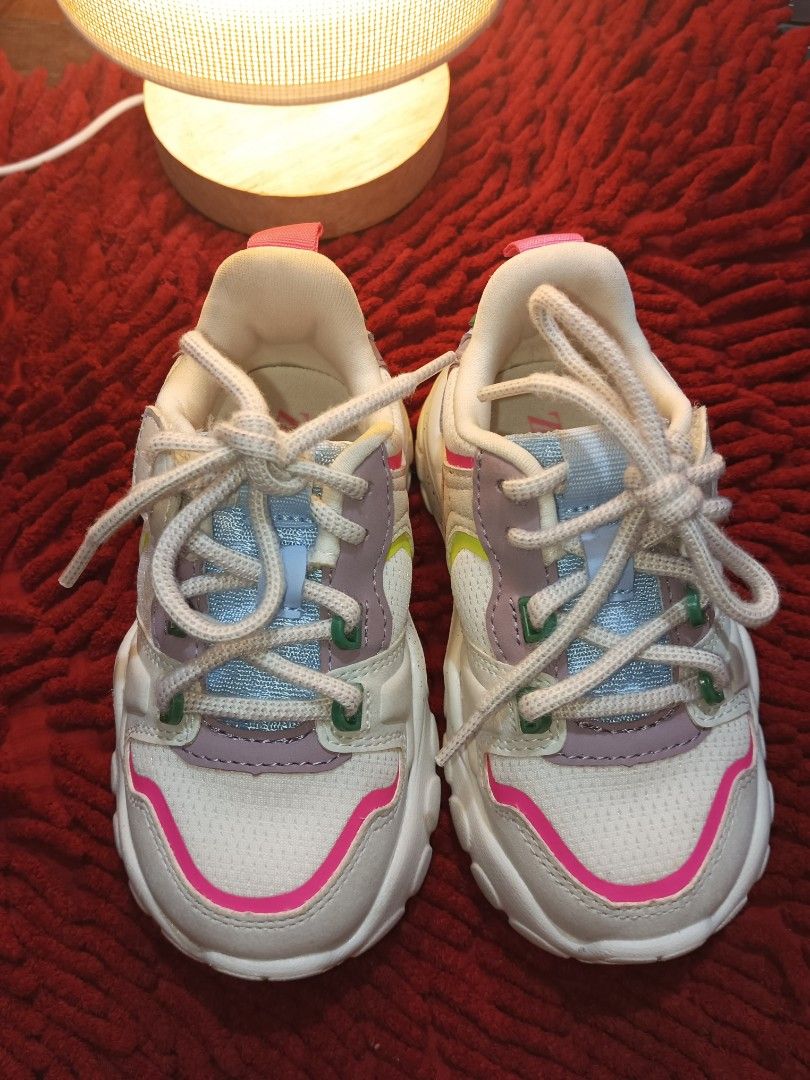 Zara Multicoloured Trainers Sneakers (Category: Babies & Kids Fashion) located in Quezon City. Submitted by whimscaprices (Listing ID 1402136938, Image 2). Description: Selling 250. Zara Multicoloured Trainers/Sneakers - Chunky sole - Pastel color mix Brand: Zara Condition: 10/10 No box Used less than 5x and kept in storage. Size: 22 on tag (Fits 1yo to 2yo or depends on your child's feet size) RFS: Decluttering big time and making spaces for my 