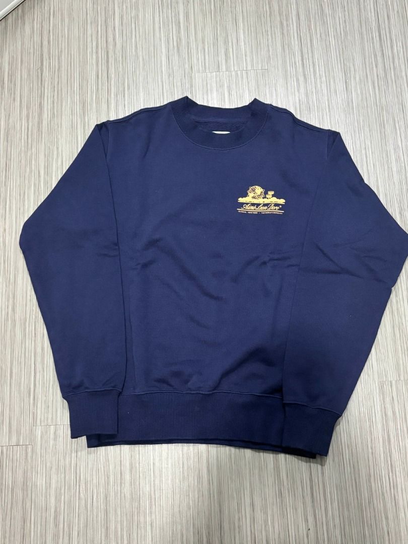 Aimé Leon Dore Unisphere Sweatshirt (Category: Luxury Apparel) located in Pasig City. Submitted by luxproducs (Listing ID 1402385326, Image 2). Description: - Aimé Leon Dore Unisphere Sweatshirt - Navy blue color - No issues Pm for measurements.