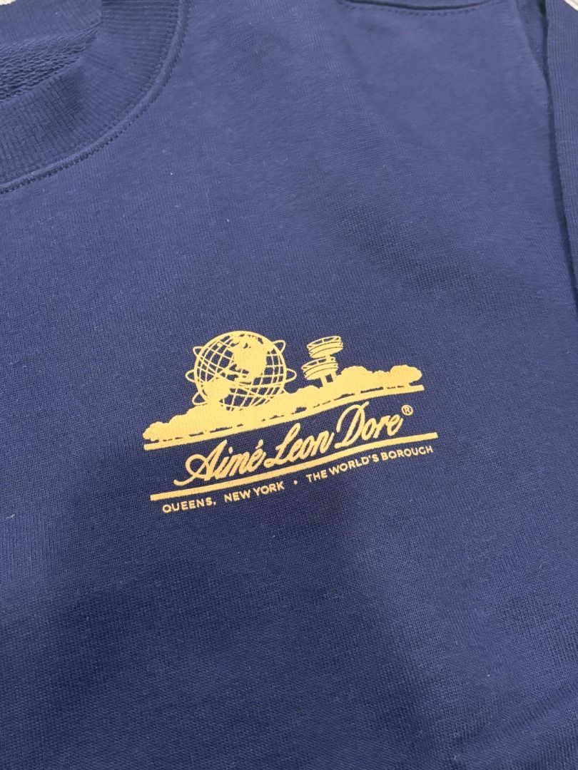 Aimé Leon Dore Unisphere Sweatshirt (Category: Luxury Apparel) located in Pasig City. Submitted by luxproducs (Listing ID 1402385326, Image 3). Description: - Aimé Leon Dore Unisphere Sweatshirt - Navy blue color - No issues Pm for measurements.