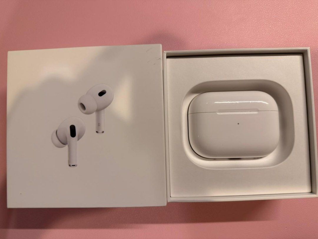 Apple AirPods Pro 2nd Generation (Category: Earphones) located in Manila. Submitted by mr.arnie (Listing ID 1402362883, Image 1). Description: - Apple AirPods Pro 2nd Generation - Includes MagSafe Charging Case - Lightly used - White AirPods and charging case - Box features product image and information.