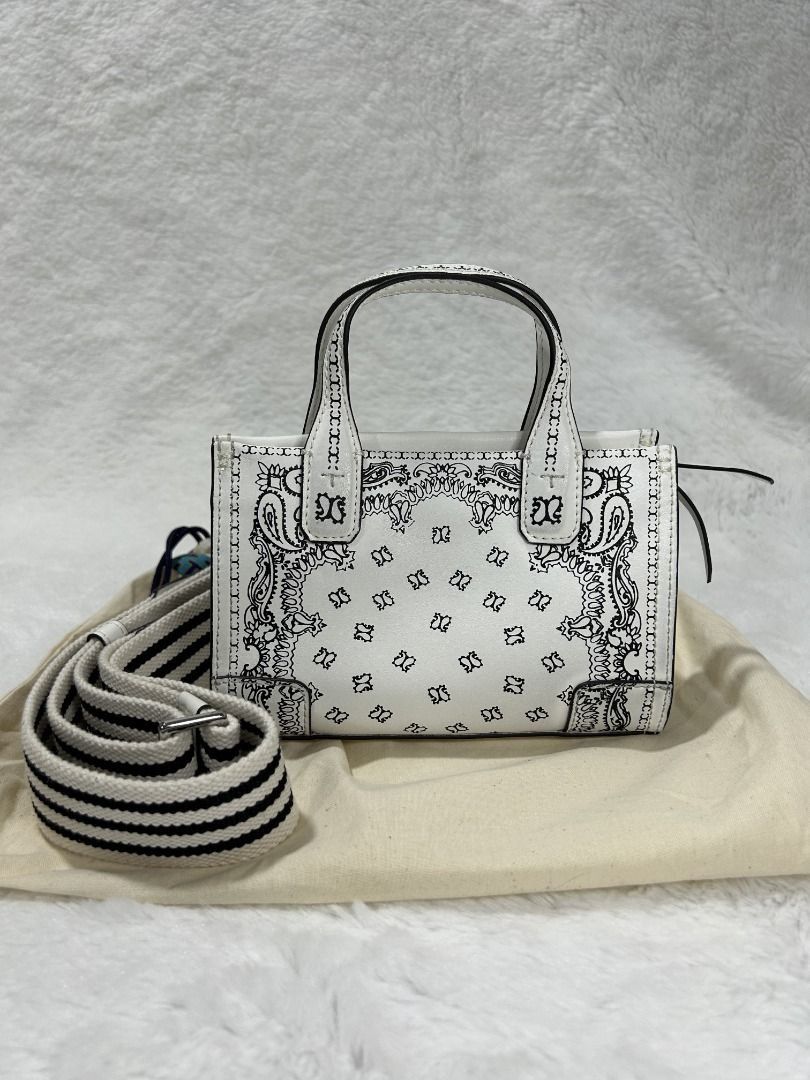 Authentic Tory Burch Ella Printed Leather Micro Tote Bag (Category: Luxury Bags & Wallets) located in Manila. Submitted by jeanskiecloset (Listing ID 1402288200, Image 1). Description: 100% Authentic Tory Burch Ella Printed Leather Micro Tote Bag 🇺🇸 Preloved, Excellent Condition Zipper closure Top handles with 2.8" (7 cm) drop Removable crossbody strap with 23.1" (58 cm) drop Height: 4.8" (12 cm); length: 7.2" (18 cm); depth: 2.8" (7 cm).