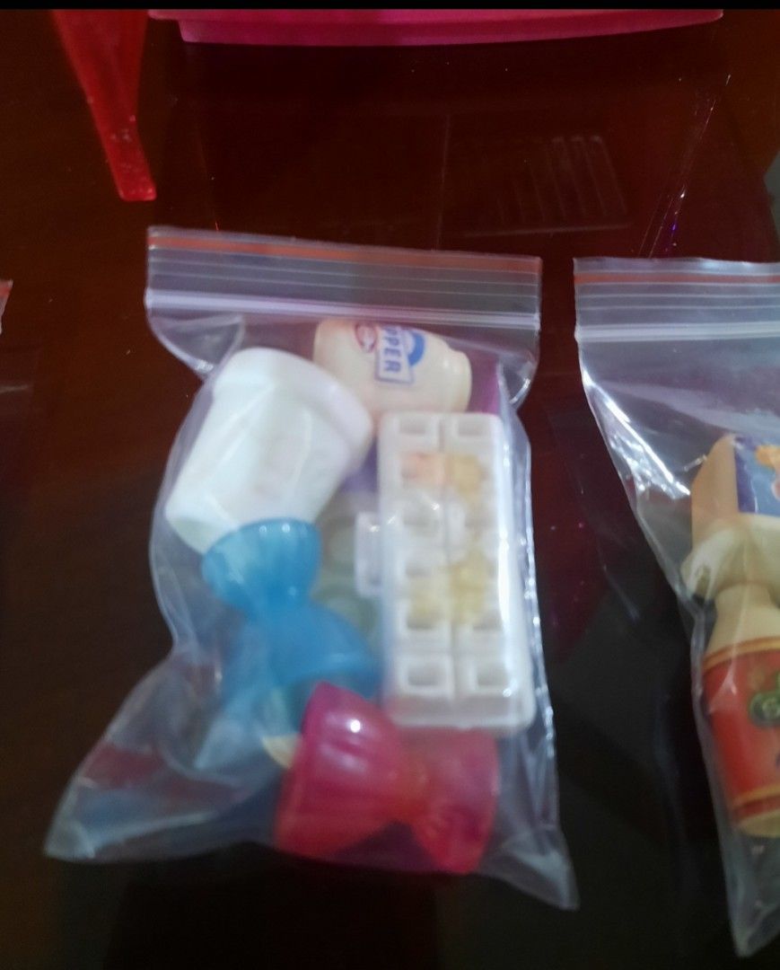 Barbie Pink Refrigerator with Accessories (Category: Kids Toys) located in Quezon City. Submitted by bonasheryl63965 (Listing ID 1402324998, Image 3). Description: - Pink dollhouse refrigerator - Includes miniature food items: milk cartons, juice bottles, cake - Features shelves and doors - Accessories packaged in clear bags - Ideal for dollhouse play includes 1 doll.