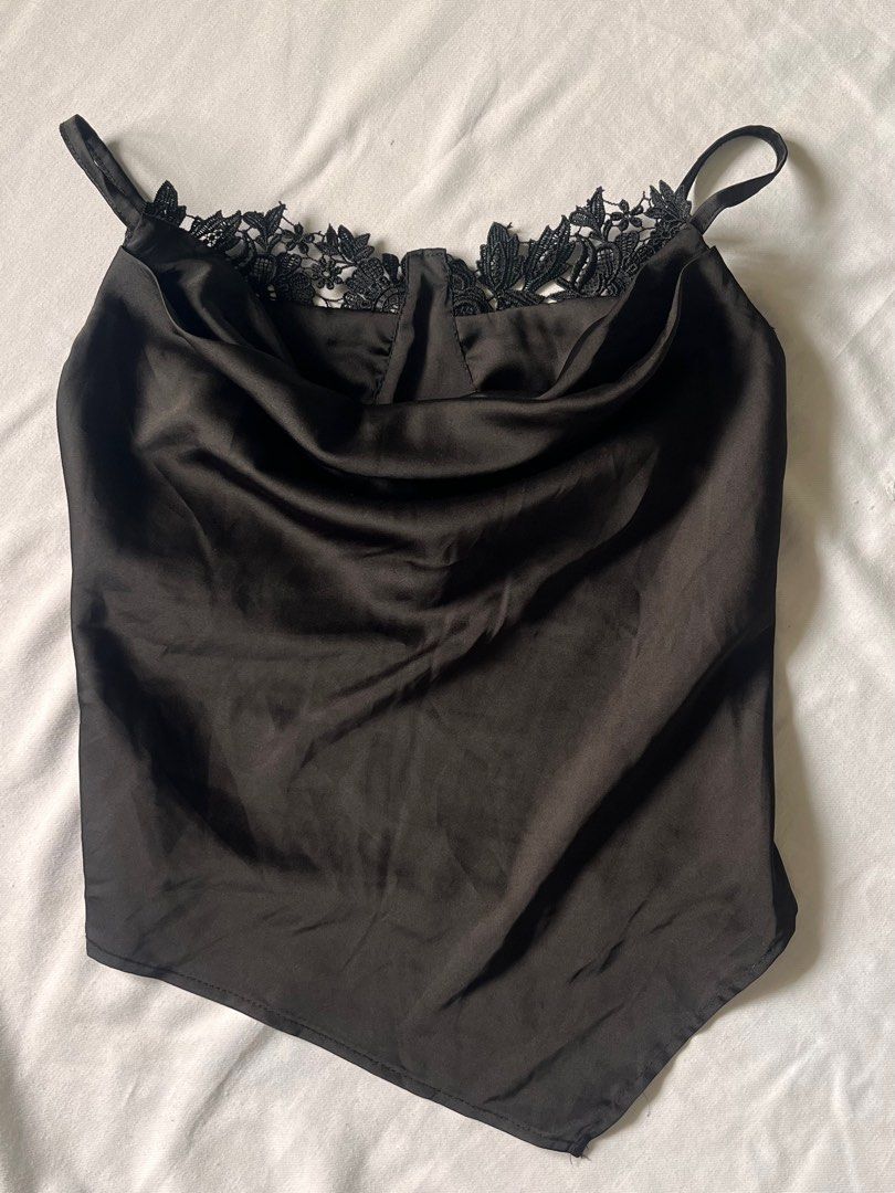 Black Satin Top with Lace Detail (Category: Sleeveless) located in Calamba. Submitted by natalierav (Listing ID 1402298985, Image 1). Description: - Black satin top - Delicate lace neckline - Adjustable spaghetti straps - Asymmetrical hem - Shirred back for comfort - Perfect for a night out or special events - XS-S.