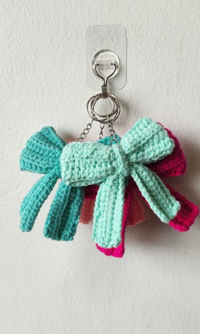 Bow keychains (Category: Handmade Craft) located in Singapore. Submitted by mojinacrochet (Listing ID 1402291546, Image 4). Description: made with milk cotton yarn can be custom made in other colours bulk orders can be done.