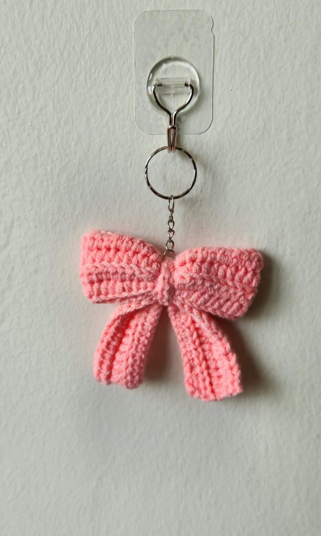 Bow keychains (Category: Handmade Craft) located in Singapore. Submitted by mojinacrochet (Listing ID 1402291546, Image 2). Description: made with milk cotton yarn can be custom made in other colours bulk orders can be done.