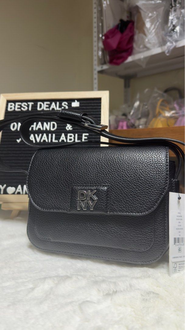 Brand new and Original DKNY bag (Category: Shoulder Bags) located in Paranaque City. Submitted by markkann (Listing ID 1402391135, Image 2). Description: Brand new On hand Original DKNY black shoulder/Sling bag With adjustable shoulder strap.