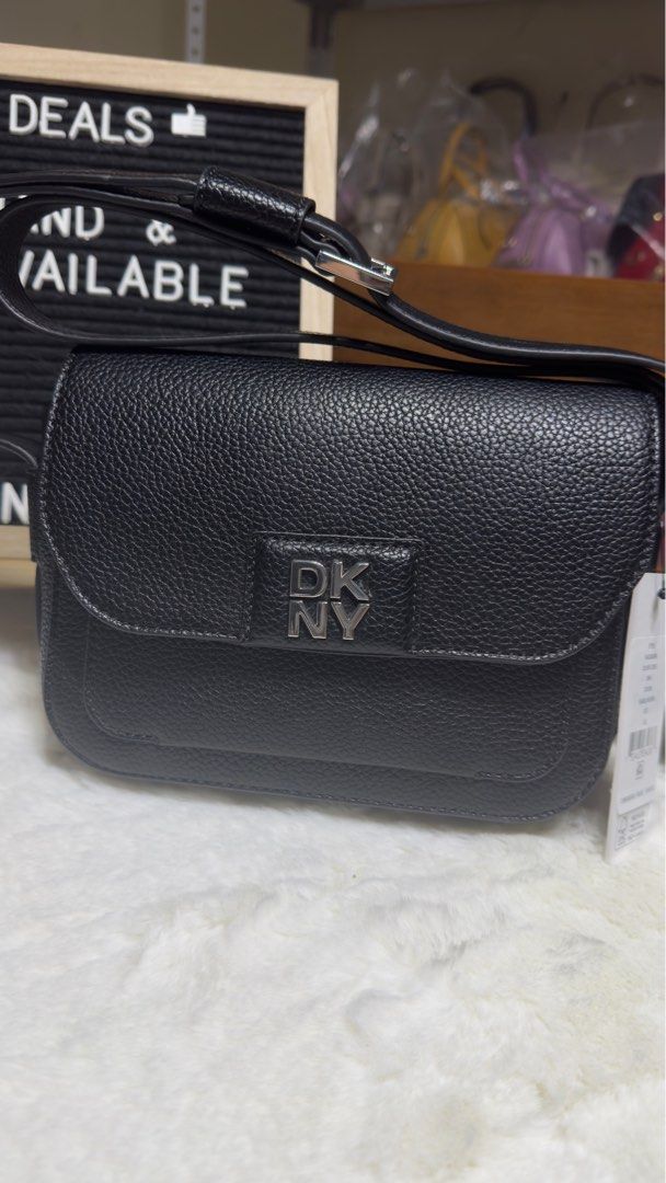 Brand new and Original DKNY bag (Category: Shoulder Bags) located in Paranaque City. Submitted by markkann (Listing ID 1402391135, Image 1). Description: Brand new On hand Original DKNY black shoulder/Sling bag With adjustable shoulder strap.