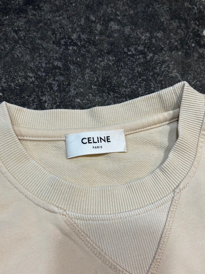 Celine Paris Short Sleeve Sweatshirt (Category: Luxury Apparel) located in General Trias. Submitted by max_thrifted (Listing ID 1402340968, Image 3). Description: - Celine Paris sweatshirt -Small on tag -Weight: 21.2 -Length: 25 - Features iconic Celine logo and horse carriage graphic - Made from 100% cotton - Includes Celine label and size tag - Made in Italy -Like new .