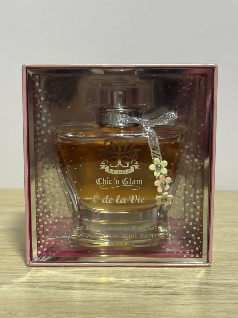 Chic 'n Glam O de la Vie Eau de Parfum (Category: Fragrance & Deodorants) located in Dasmarinas. Submitted by preloved.frommary (Listing ID 1402417403, Image 1). Description: Never pong nagamit and di nabawasan dm for details! 80ml This Woody Acquatic fragrance has a blend of Bergamot, Lemon, Grapefruit, Peach, Pink berries, Iris, Orange blossom, Jasmine, Patchouly, Musk, Amber.