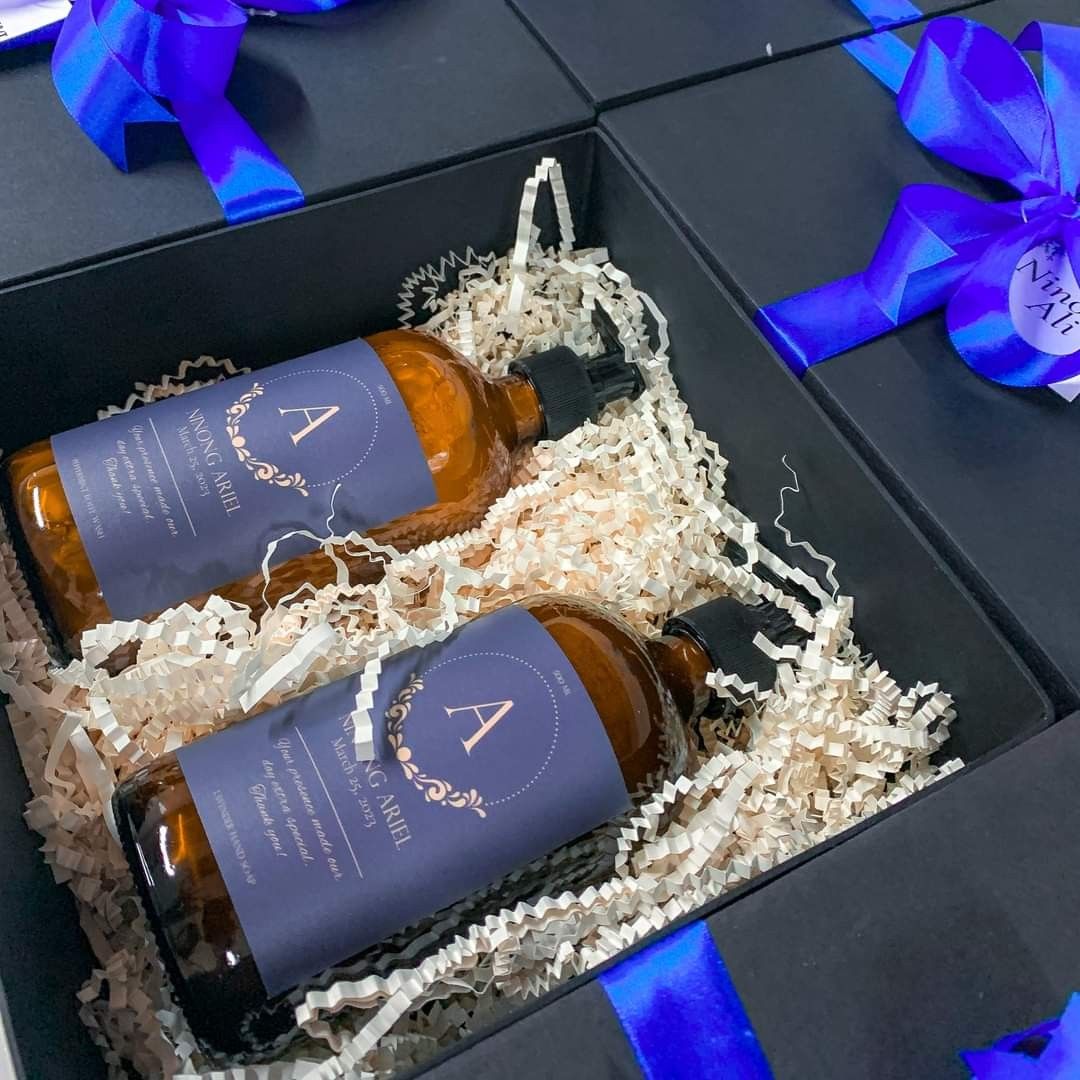 Customized Soap and Alcohol Gift Set (Category: Bath) located in Quezon City. Submitted by alwaysdeclutter (Listing ID 1402361648, Image 1). Description: Elegant gift sets perfect for any occasion. Each set includes beautifully packaged hand soap, alcohol, and body wash. Available in various styles, including black and white bottles with minimalist labels, and brown bottles with personalized labels. Ideal for gifting or personal use..