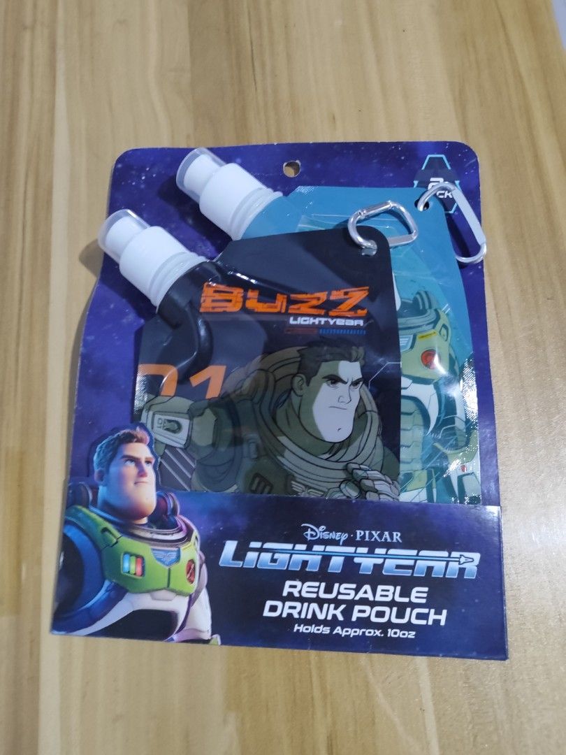 Disney Pixar's Buzz Lightyear Reusable Drink Pouch 10oz, 2 per Pack (Category: Water Bottles & Tumblers) located in Minalin. Submitted by easyshoppe15 (Listing ID 1402471780, Image 2). Description: 2 - Reusable Drink Pouch Holds Approx. 10oz Buy 1 Get 1 for P500 P300 per pack Black and Blue Buzz Lightyear Pouches Green and White Buzz Lightyear Pouches.