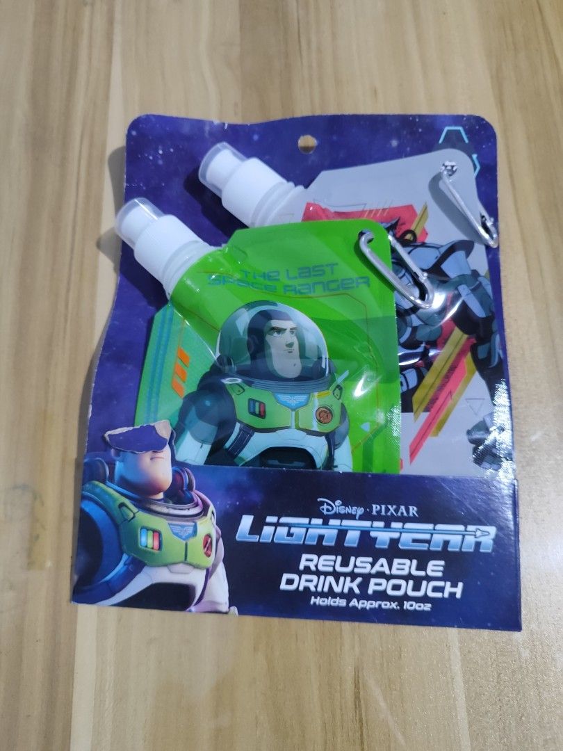 Disney Pixar's Buzz Lightyear Reusable Drink Pouch 10oz, 2 per Pack (Category: Water Bottles & Tumblers) located in Minalin. Submitted by easyshoppe15 (Listing ID 1402471780, Image 3). Description: 2 - Reusable Drink Pouch Holds Approx. 10oz Buy 1 Get 1 for P500 P300 per pack Black and Blue Buzz Lightyear Pouches Green and White Buzz Lightyear Pouches.