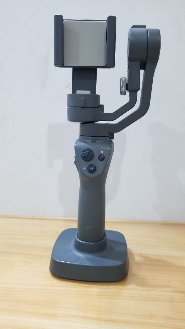 DJI Osmo Mobile 2 Gimbal with stand and carrying case (Category: Gimbals & Stabilizers ) located in Manila. Submitted by gemini51 (Listing ID 282178711, Image 2). Description: Like new and slightly used DJI Osmo Mobile 2 gimbal. Includes the following bonuses: 1. Gimbal stand for better stability 2. Carrying case to easily bring anywhere I prefer to meet at Eastwood city. We can also discuss another location. .