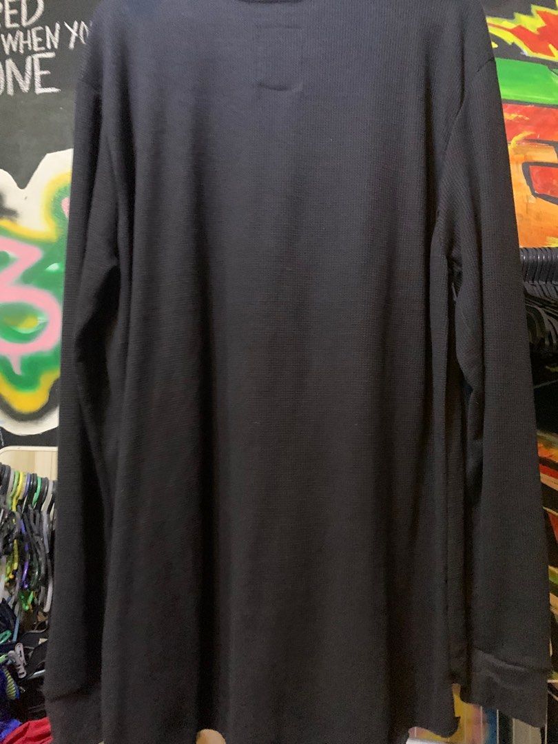 Ecko Unltd. Long Sleeve Shirt - 2XL (Category: Tshirts & Polo Shirts ) located in Angeles City. Submitted by danedane06 (Listing ID 1402388962, Image 3). Description: Black long sleeve shirt from Ecko Unltd. Features the brand's logo on the front. The shirt is a waffle knit style. The tag indicates the size is 2XL. Made in Pakistan. The shirt has a crew neck and long sleeves..