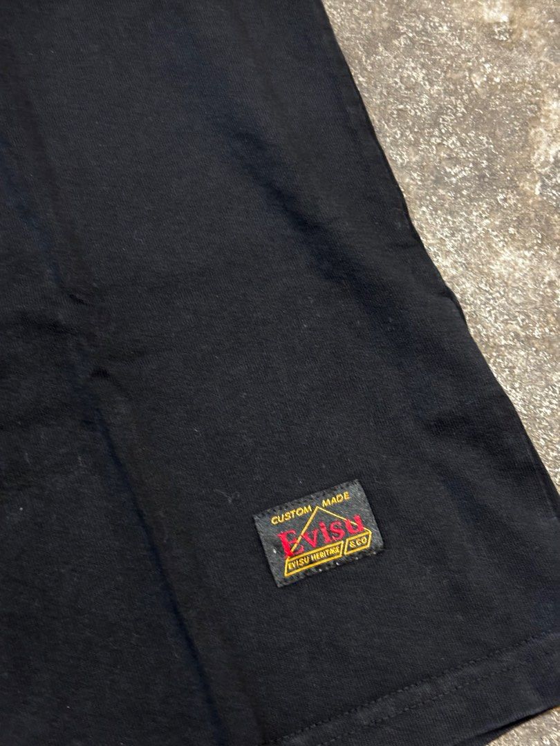 Evisu Heavy Industries Black T-shirt (Category: Tshirts & Polo Shirts ) located in General Trias. Submitted by max_thrifted (Listing ID 1402336090, Image 3). Description: -Evisu Heavy Industries Black T-shirt -Medium on tag -Weight: 19.5 -Length: 2.5 -Exellent condition -No issue -Like new.