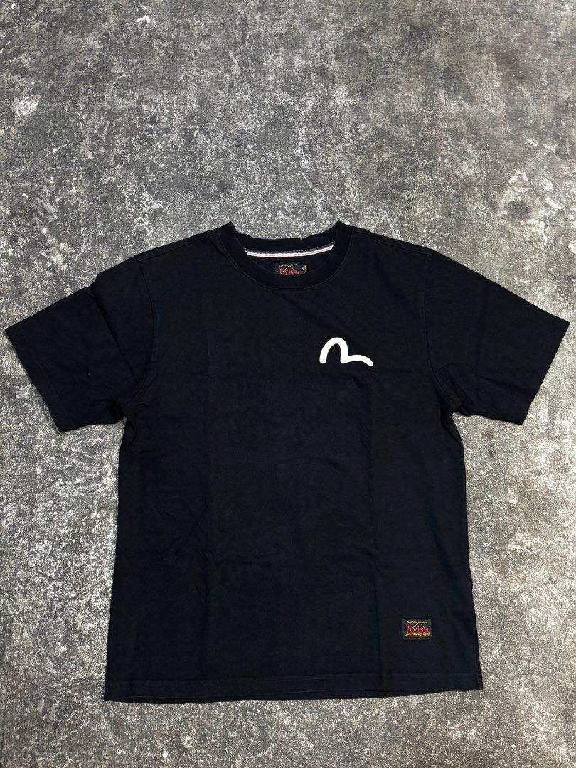 Evisu Heavy Industries Black T-shirt (Category: Tshirts & Polo Shirts ) located in General Trias. Submitted by max_thrifted (Listing ID 1402336090, Image 2). Description: -Evisu Heavy Industries Black T-shirt -Medium on tag -Weight: 19.5 -Length: 2.5 -Exellent condition -No issue -Like new.