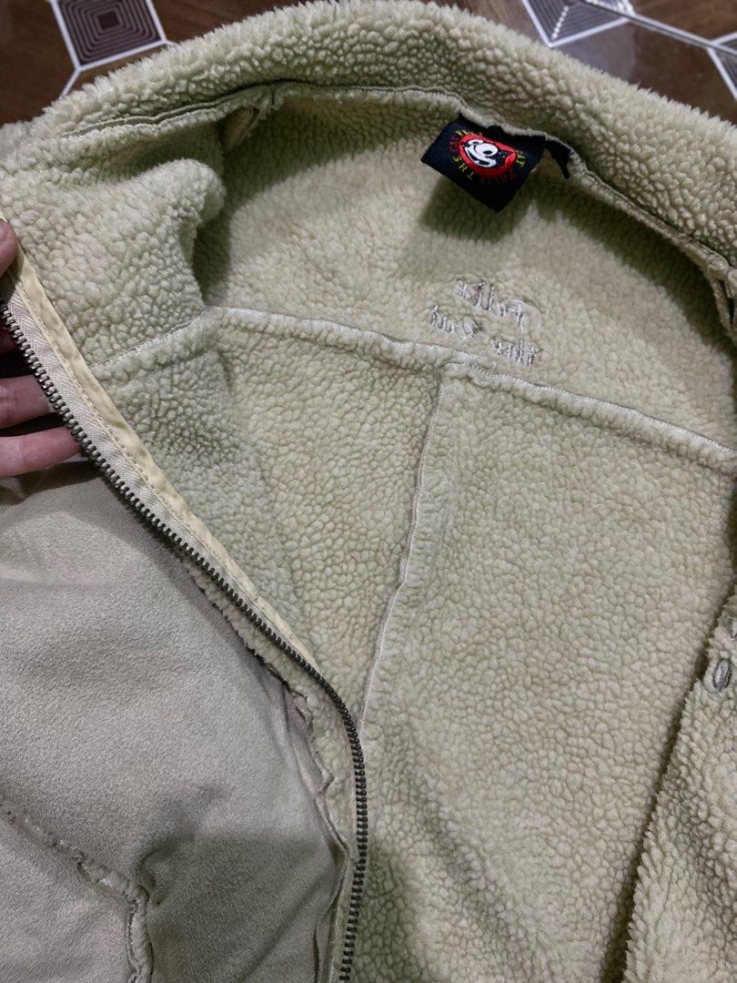 Felix the Cat Jacket (Category: Coats, Jackets and Outerwear) located in Manila. Submitted by urfavenini (Listing ID 1402377539, Image 2). Description: Can fit s-m Jacket features a Felix the Cat design. It has a zip-up front and a fleece-lined interior. The jacket has a beige exterior with stitched detailing. The Felix the Cat logo is embroidered on the front. The back of the jacket also has the Felix the Cat logo. .