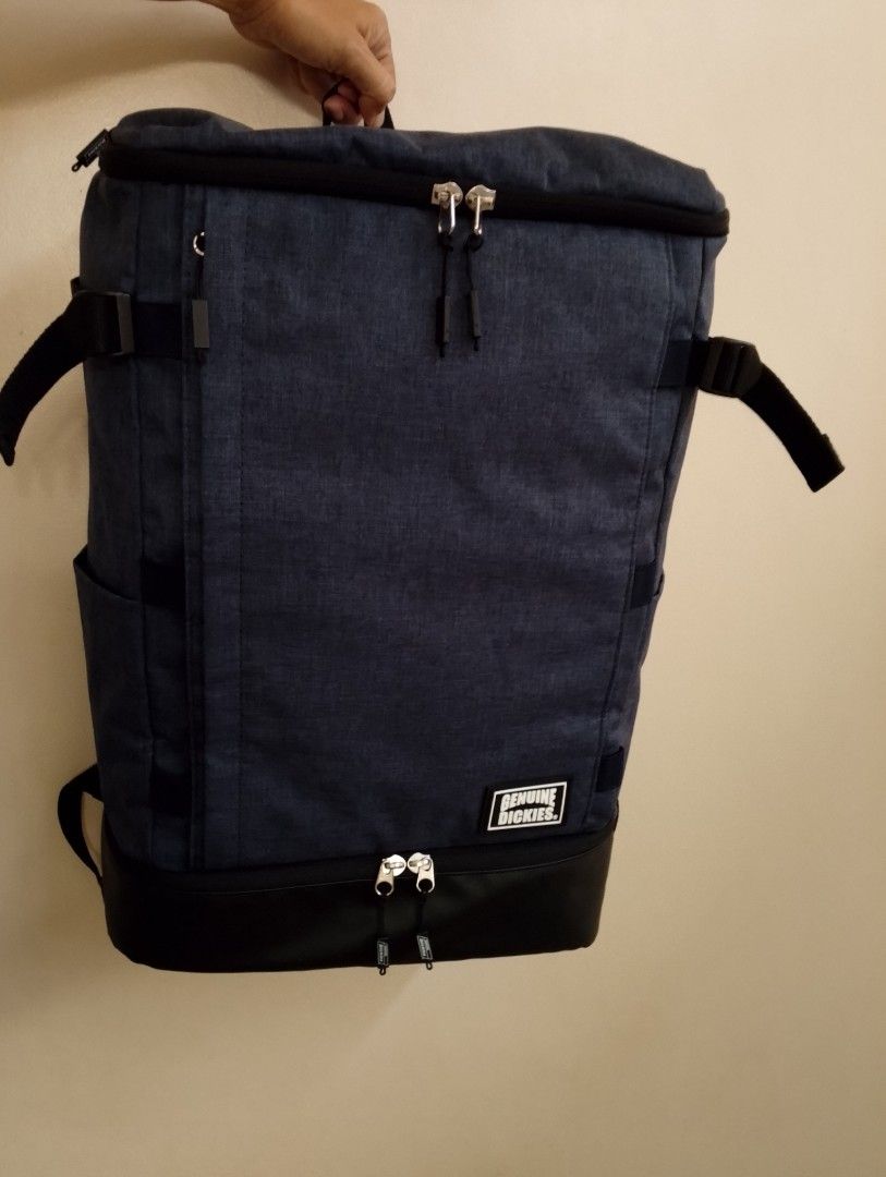 Genuine Dickies Big Backpack (Category: Backpacks) located in Binangonan. Submitted by stufflikedat (Listing ID 1402367711, Image 2). Description: Genuine Dickies 73-17 big & square 2-layer backpack for commuting travelling school work or gym with shoes compartment, denim ash blue polyester material in excellent pre-loved condition, all zippers are intact no tear or loose threads, approx height 20.5" x width 13" x depth 6.9" 5 pockets (4 exterior