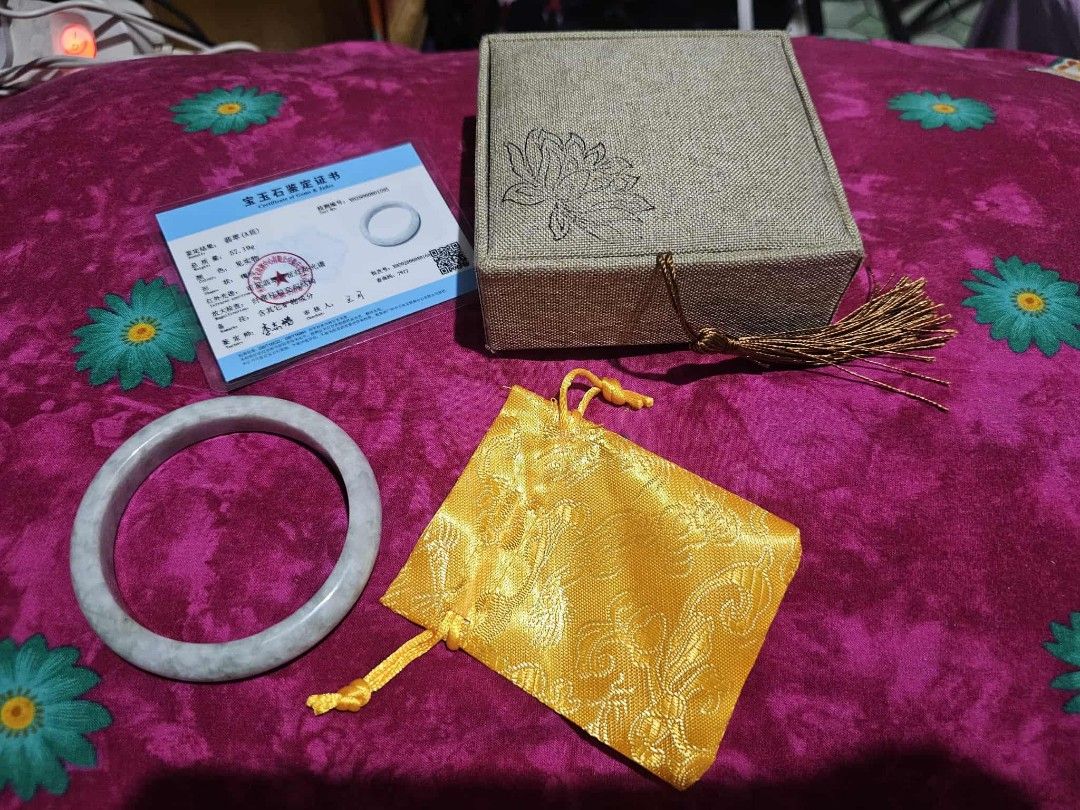 Grade A Jade Bangle with Certificate (Category: Bracelets) located in Makati City. Submitted by loop_0210 (Listing ID 1402386139, Image 2). Description: authentic bnew jade bangle (grade A) rfs: doesn't fit pickup: Makati/bgc.
