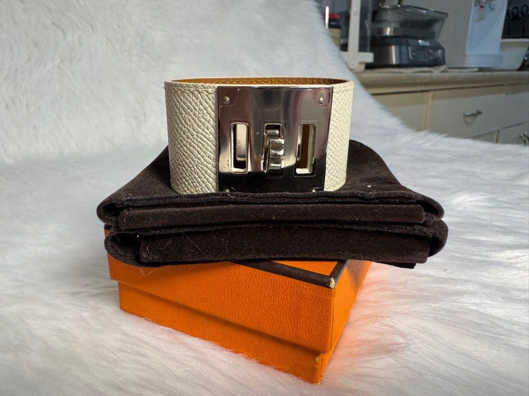 Hermès Kelly Dog Bracelet (Category: Luxury Accessories) located in San Juan City. Submitted by seeclosetfinds (Listing ID 1402414103, Image 2). Description: - Authentic Hermès Kelly Dog bracelet - White leather exterior - Silver-tone metal clasp - Includes original box and dust bag - Interior leather: Tan color - Made in France Market Price : 45,000 Selling Price : 30,000.
