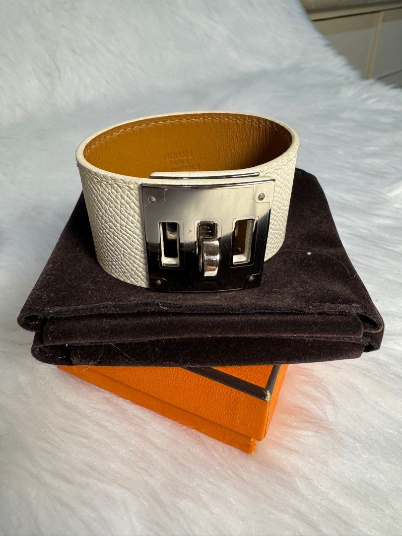 Hermès Kelly Dog Bracelet (Category: Luxury Accessories) located in San Juan City. Submitted by seeclosetfinds (Listing ID 1402414103, Image 1). Description: - Authentic Hermès Kelly Dog bracelet - White leather exterior - Silver-tone metal clasp - Includes original box and dust bag - Interior leather: Tan color - Made in France Market Price : 45,000 Selling Price : 30,000.