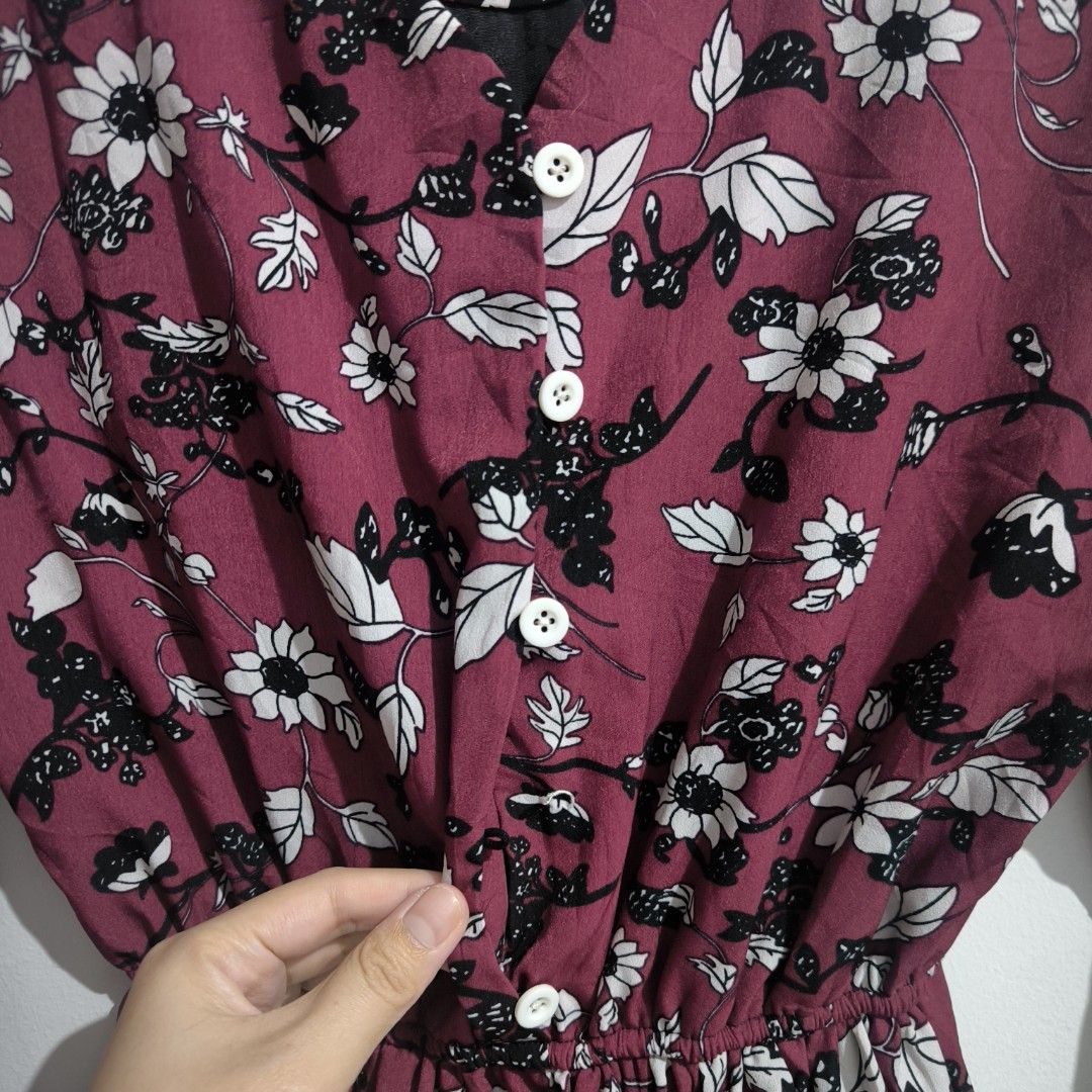 Maroon Floral Dress (Category: Dresses) located in Makati City. Submitted by mampuan (Listing ID 1402465435, Image 2). Description: - Floral print dress - Colors: Maroon, white, and black - Long sleeves - V-neck with button details - Elastic waist - Ruffled hem - Size: Small - With missing one button.