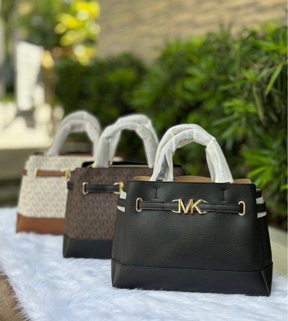 Michael Kors Reed Satchel (Category: Luxury Bags & Wallets) located in Santa Rosa. Submitted by miqboutique (Listing ID 1402374340, Image 1). Description: MK Reed Satchel ₱5,950 + SF • Ready to ship • Guaranteed Original Fb page: Miq's Boutique.