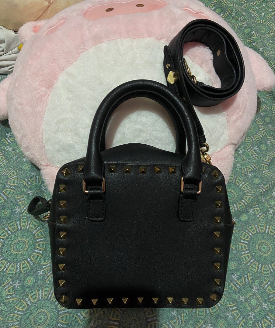 Miu Miu Black Studded Handbag With Sling (Category: Luxury Bags & Wallets) located in Talavera. Submitted by thr1ftyren (Listing ID 1402436620, Image 3). Description: Baka may looking po nito🚨 Miu Miu 2 way handle/sling leather bag Excellent condition Color rate 9.8/10 No issues Mine 1300 + sf Dm to purchase📥 📍Location Nueva Ecija.