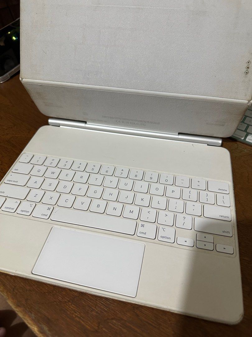 Original Apple Magic Keyboard for iPad Pro 12.9 M1 / M2 ( 3rd generation / 4th generation / 5th generation / 6th generation) (Category: Computer Keyboard) located in Manila. Submitted by razelysonn (Listing ID 1402385058, Image 2). Description: FIXED PRICE - selling low already - just needs cleaning as well all keys and trackpad working well Side by side posted :) location: Binondo Manila .