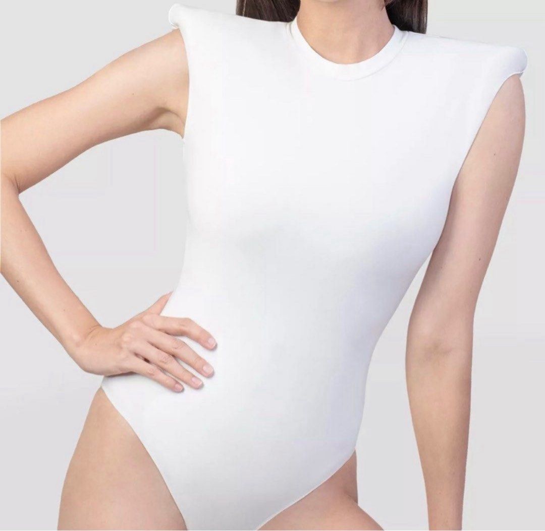 Patton Shoulder Pad Bodysuit (Black) (Category: Others Tops) located in Manila. Submitted by adeth8 (Listing ID 1402413549, Image 2). Description: - Patton bodysuit - Available colors: Black only - Features shoulder pads - Round neckline - Form-fitting design - Perfect for a chic, modern look used twice.