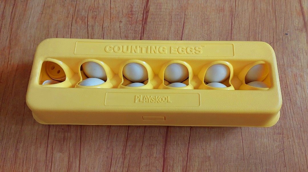 Playskool Counting Eggs Educational Toy Vintage (Category: Educational & Learning Toys) located in Manila. Submitted by tsinelasni55674 (Listing ID 1402300569, Image 1). Description: - Vintage Playskool Counting Eggs toy - Rare, Vintage 1987 - Teaches numbers and counting - Includes a yellow egg carton - AS IS - Actual Photos - Contains 12 egg-shaped pieces - 2 lost pair no. 6 & 9 - Comes with two counting inserts - Inserts have pegs and holes fo