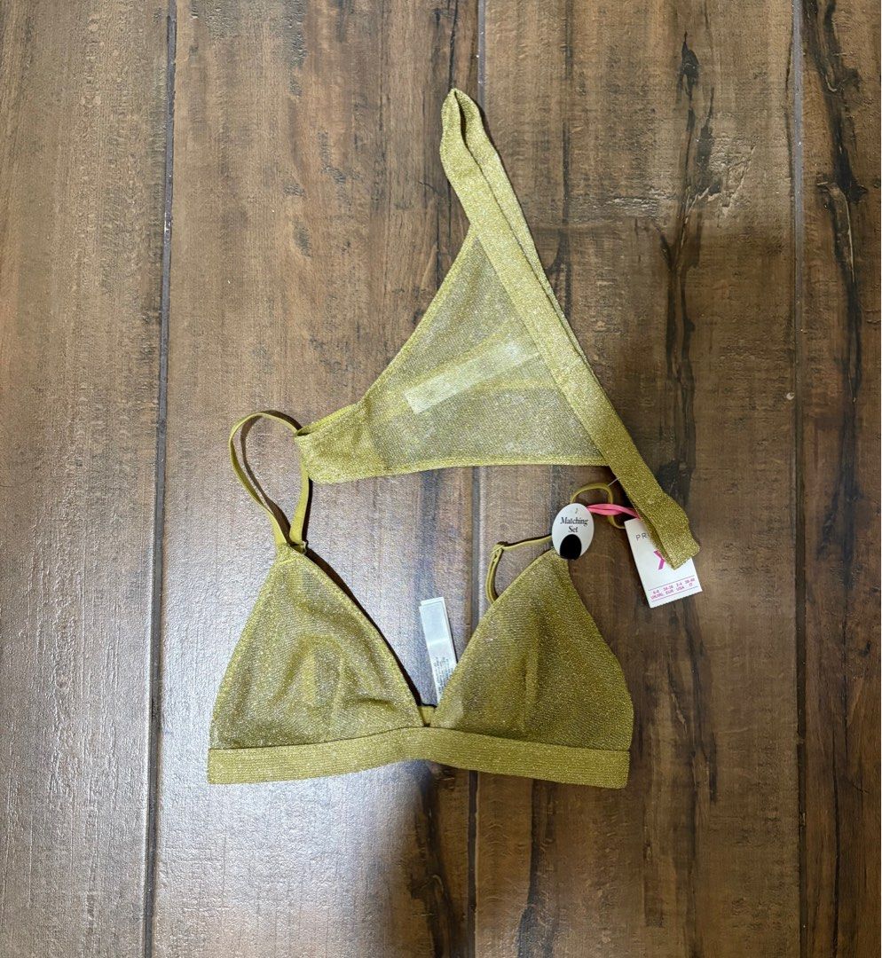 Primark Matching Thong Set - XS (metallic gold) (Category: Bikinis & Swimsuits) located in Bacolod City. Submitted by nikituuuh (Listing ID 1402344004, Image 1). Description: - Primark gold matching thong set - Size: XS - Includes triangle top and thong bottom - Triangle top with thin straps - New with tags.