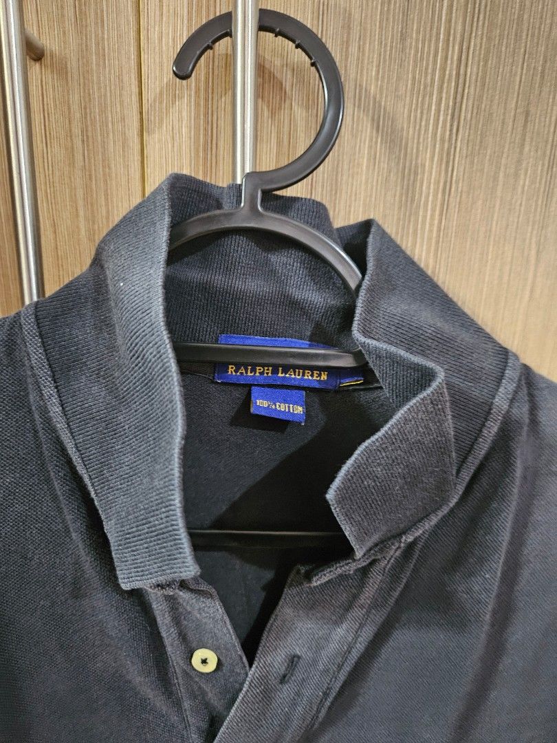 Ralph Lauren Polo Shirt (Category: Tshirts & Polo Shirts ) located in Manila. Submitted by may.lc (Listing ID 1402315368, Image 3). Description: - black Ralph Lauren polo shirt - Iconic polo player logo - 100% cotton - Button-down collar - Short sleeves - Made in Indonesia - Classic fit - Well-worn condition.