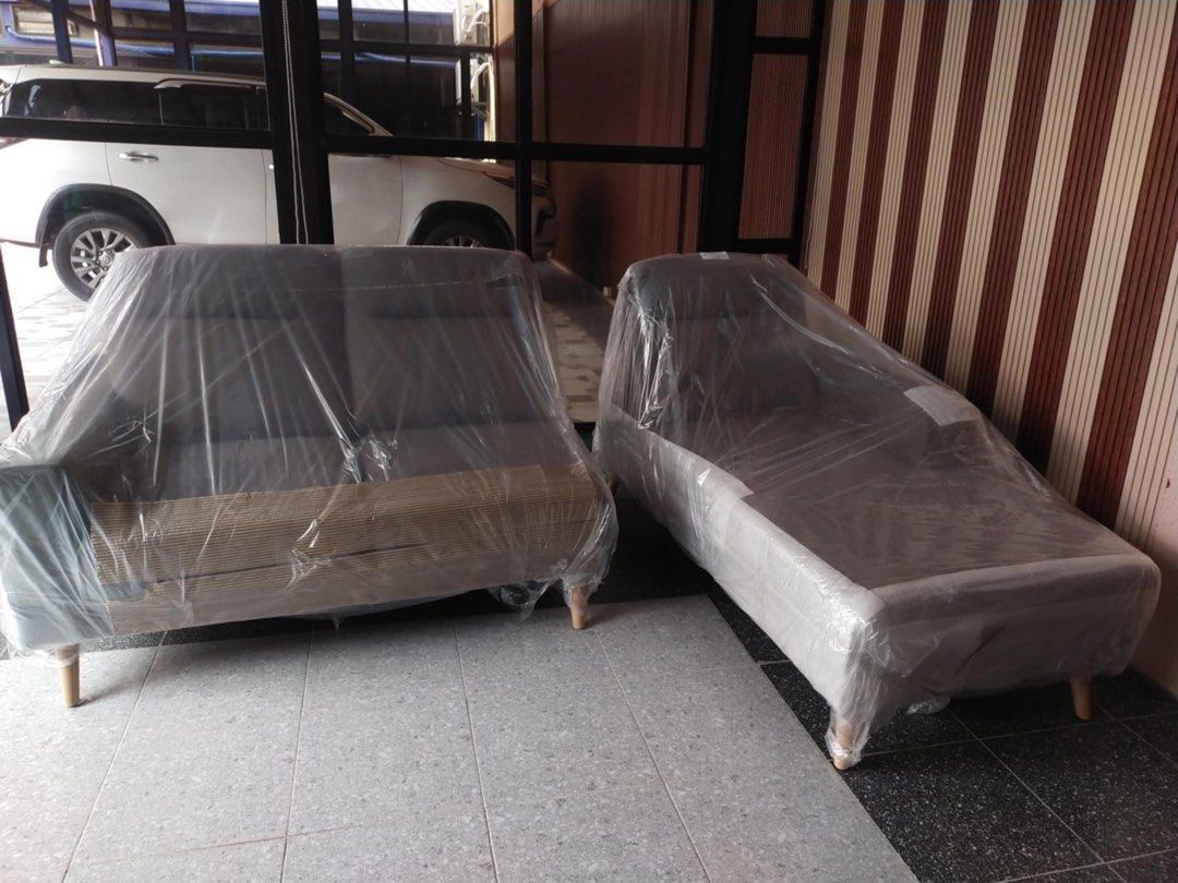 Blims Sofa (Category: Sofas) located in Manila. Submitted by ml0626 (Listing ID 1402349492, Image 1). Description: BLIMS Valentin Sectional Adjustable Sofa Bed Reupholstered for new user - Sofa set L Shaped - Both pieces wrapped in protective plastic - Sofa: Gray fabric, wooden legs.