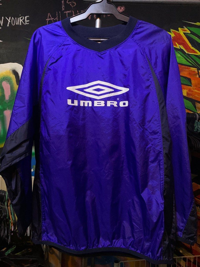 Umbro Dri Fit Jacket (Category: Coats, Jackets and Outerwear) located in Angeles City. Submitted by danedane06 (Listing ID 1402389704, Image 1). Description: - Umbro purple V-neck jacket - Features Umbro logo - Black accents on sleeves and sides - Size: 160 - Made in China.