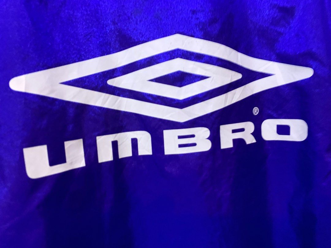 Umbro Dri Fit Jacket (Category: Coats, Jackets and Outerwear) located in Angeles City. Submitted by danedane06 (Listing ID 1402389704, Image 2). Description: - Umbro purple V-neck jacket - Features Umbro logo - Black accents on sleeves and sides - Size: 160 - Made in China.