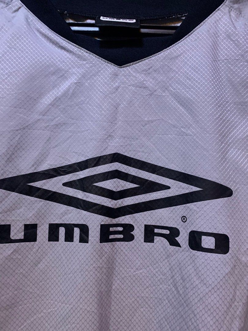 Umbro Motion Control Jacket (Category: Coats, Jackets and Outerwear) located in Angeles City. Submitted by danedane06 (Listing ID 1402389931, Image 3). Description: - Umbro Motion Control jacket - Color: White, black, and blue accents - Features Umbro logo - V-neck collar - Long sleeves - Size: see tag in photos - Model: UBS4822 - Made in China Issues: see last photos.