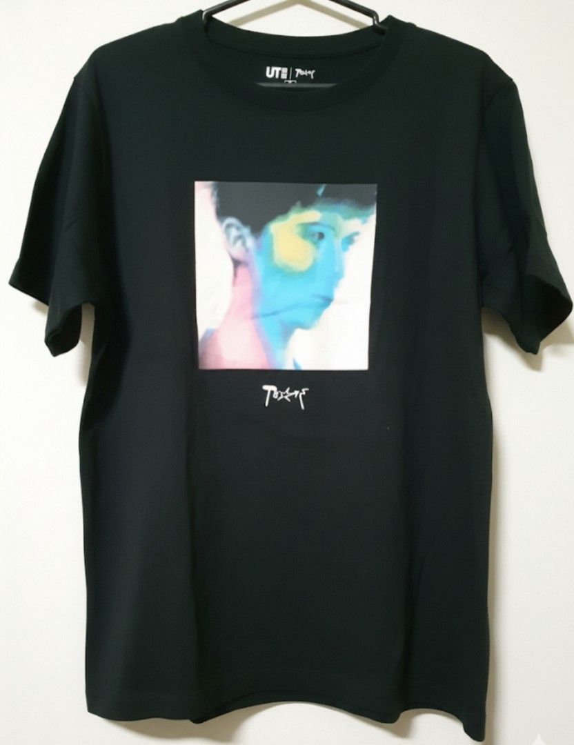 Uniqlo UT T-shirt (Category: Tshirts & Polo Shirts ) located in Las Pinas. Submitted by alanvides (Listing ID 1397795064, Image 1). Description: - Troye Sivan Uniqlo CollabB UT T-shirt - Features a vibrant graphic print - Classic crew neck design - Short sleeves for comfort - Includes artist's name - Uniqlo UT logo present.