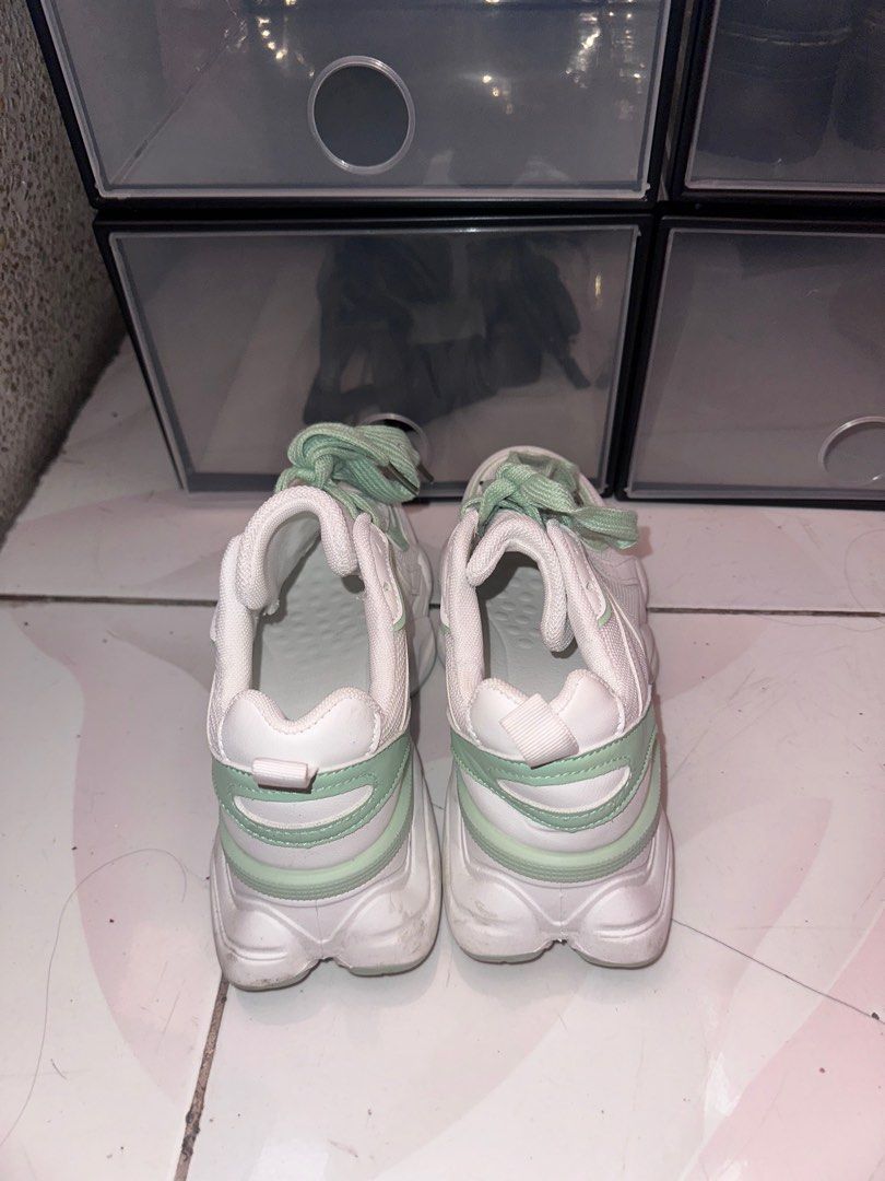 White Sneakers with Mint Green Accents (Category: Sneakers) located in Malabon City. Submitted by tigercattt (Listing ID 1402352657, Image 3). Description: Bought this in SM for 1k..