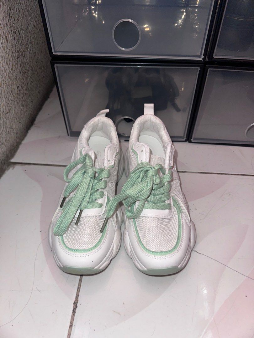 White Sneakers with Mint Green Accents (Category: Sneakers) located in Malabon City. Submitted by tigercattt (Listing ID 1402352657, Image 1). Description: Bought this in SM for 1k..