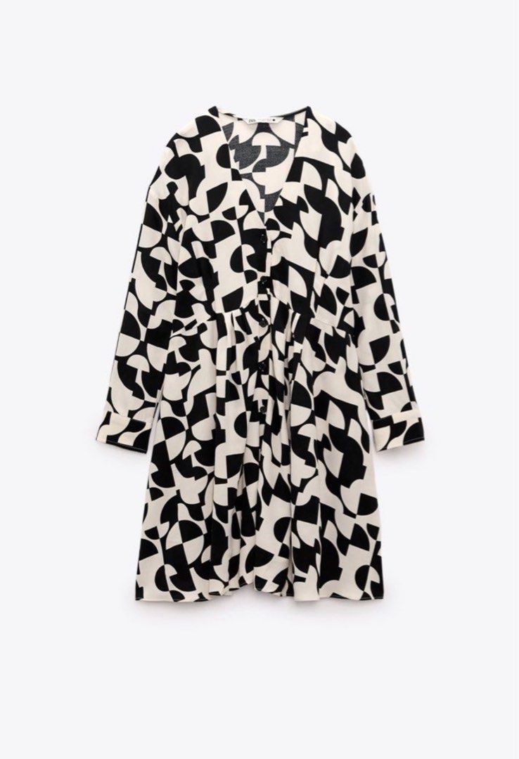 Zara Abstract Print Mini Dress (Category: Dresses) located in Cavite. Submitted by hardt0get (Listing ID 1402476266, Image 2). Description: Zara mini dress featuring an abstract black and white print. It has a V-neckline and long sleeves. The dress has a button-down front and is labeled as size S. Made in Turkey. Can fit up to medium .
