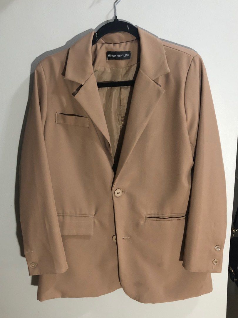 Brown Blazer (Category: Coats, Jackets and Outerwear) located in Pasig City. Submitted by ells.preloved (Listing ID 1402611844, Image 1). Description: slight flaw seen on the picture .