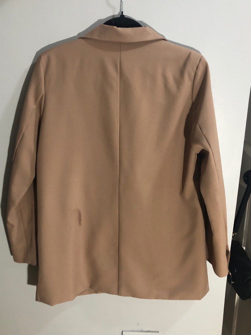 Brown Blazer (Category: Coats, Jackets and Outerwear) located in Pasig City. Submitted by ells.preloved (Listing ID 1402611844, Image 2). Description: slight flaw seen on the picture .