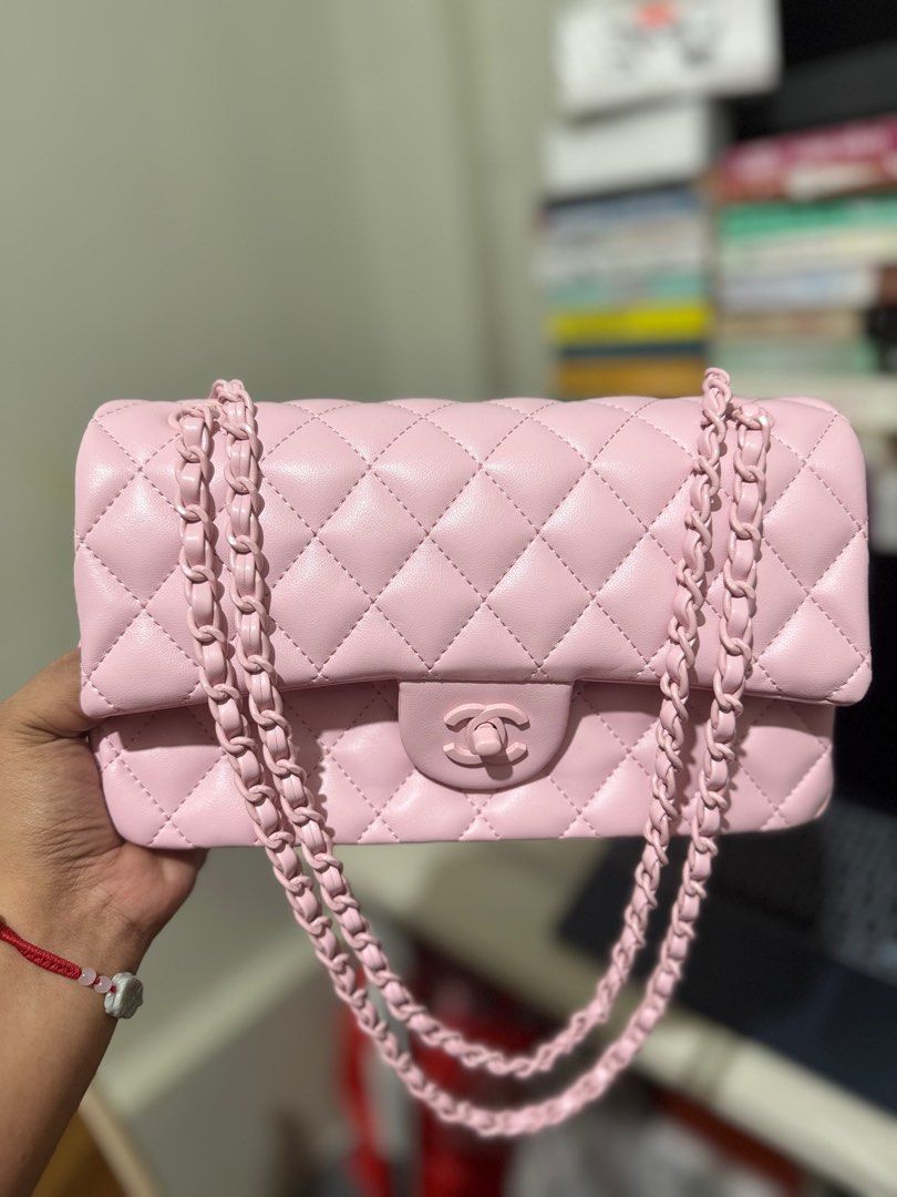 Chanel double flap 25cm all pink (Category: Luxury Bags & Wallets) located in Santa Barbara. Submitted by elleemmnnop (Listing ID 1402657727, Image 3). Description: - Chanel Classic Flap Bag - Stunning pink color - Iconic diamond quilting - Classic chain strap - Interior with multiple compartments - Made in France - Serial number: 3070117 -Lambskin -Pink hardwares No return/exchange/refund once item has been shipped so ask as many questions/photo