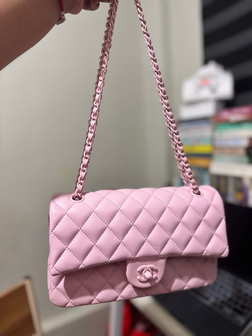 Chanel double flap 25cm all pink (Category: Luxury Bags & Wallets) located in Santa Barbara. Submitted by elleemmnnop (Listing ID 1402657727, Image 2). Description: - Chanel Classic Flap Bag - Stunning pink color - Iconic diamond quilting - Classic chain strap - Interior with multiple compartments - Made in France - Serial number: 3070117 -Lambskin -Pink hardwares No return/exchange/refund once item has been shipped so ask as many questions/photo